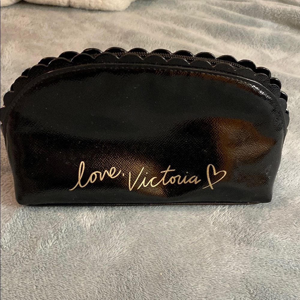 Victoria's Secret Black Cosmetic Bag with Glossy Finish and Gold Branding